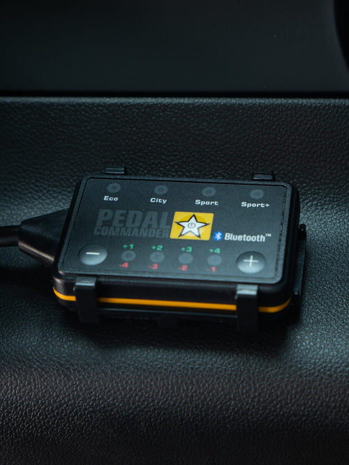 Pedal Commander Bluetooth throttle controller mounted inside a truck
