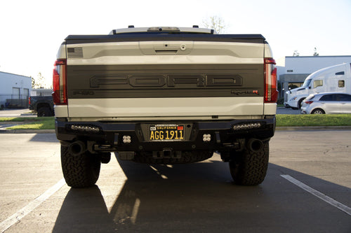 Rear view of a Ford F-150 Raptor R with a rear bumper lighting package