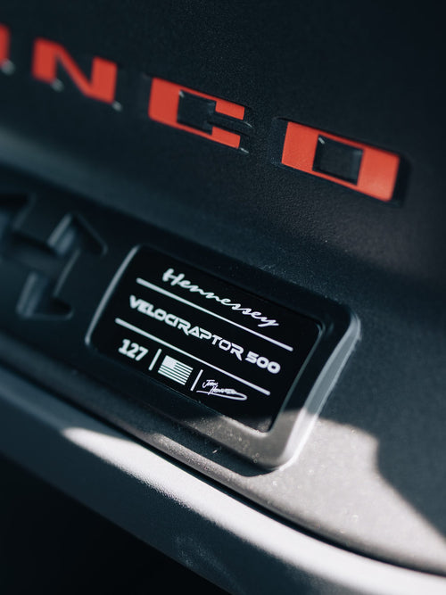 Hennessey VelociRaptor 600 plaque and red BRONCO lettering on the interior of a Ford Bronco Raptor