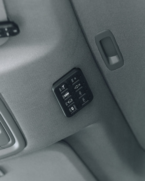 Bank of auxiliary switches in the overhead console of a Ford F-150 Lightning