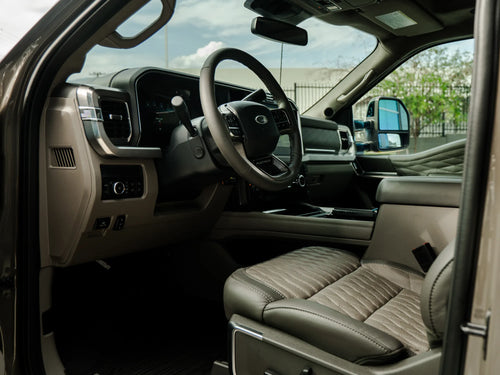 Interior dashboard and leather seats of the Ford F-450 Platinum