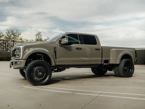 Side profile of the lifted Ford F-450 Platinum dually showing ride height