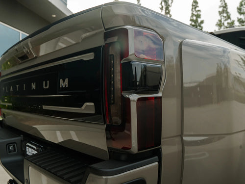 Close-up of the Ford F-450 Platinum taillight and badge