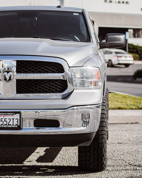 Front bumper and grille of a silver RAM 1500