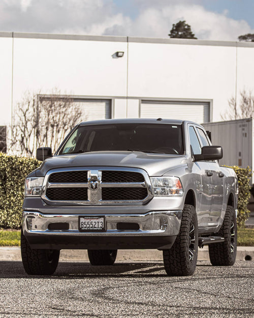 Front view of a silver RAM 1500 with black-and-machined wheels