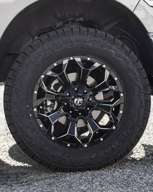 Front wheel and tire on a silver RAM 1500